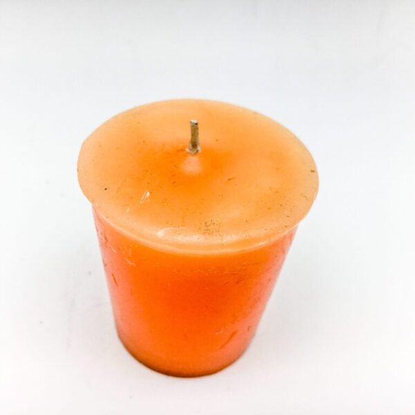 Orange Votive Candle - hand poured from our special mixture of paraffin waxes. Unscented.